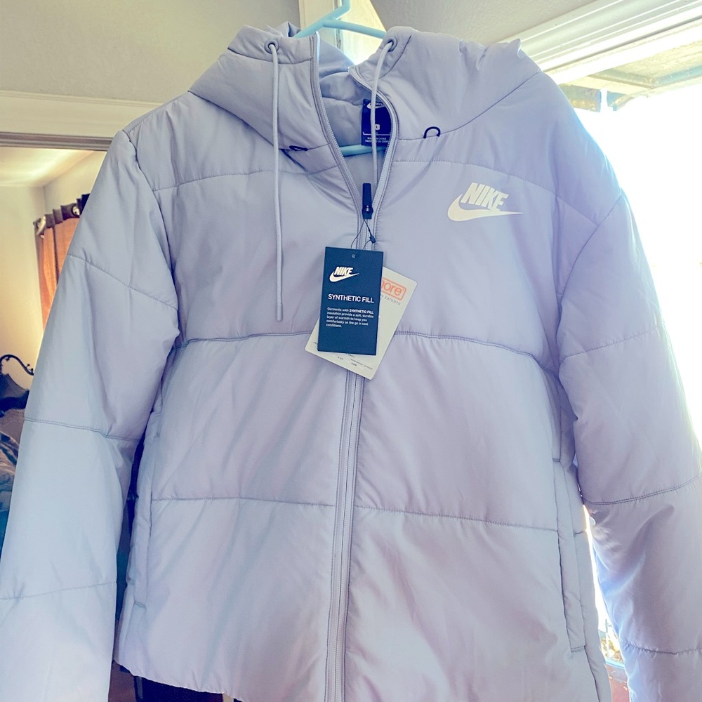 Nike coat brand new never used.